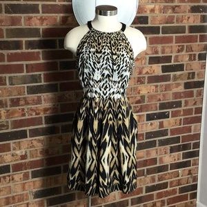 Animal print sleeveless full skirt dress pockets